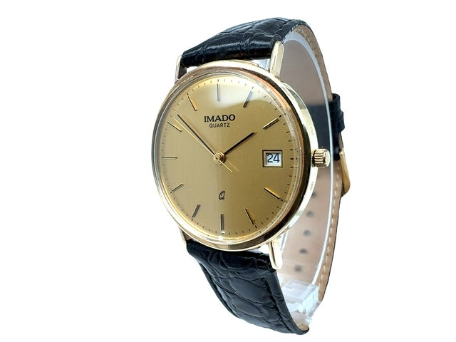 Imado Quartz Dress. Gent's 9K Yellow gold quartz watch