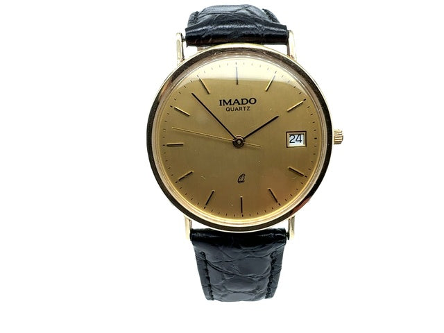 Imado Quartz Dress. Gent's 9K Yellow gold quartz watch